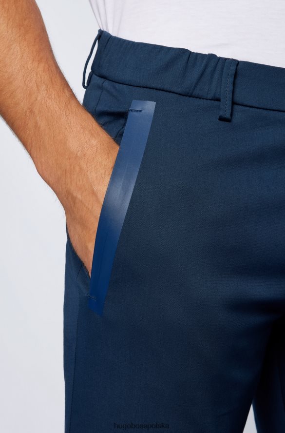 Hugo Boss ciemnoniebieskie spodnie slim fit z mieszanki zawierającej bawełnę, z kieszeniami z taśmą hugo ciemny niebieski R0X0H64105