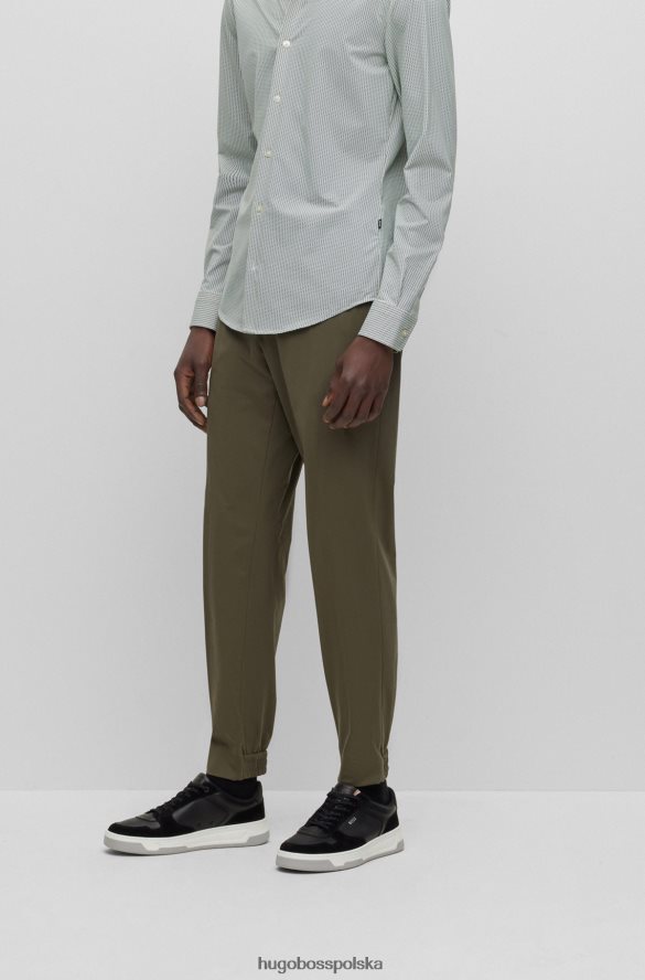 Hugo Boss ciemnozielone spodnie Hugo o dopasowanym kroju z elastycznego jerseyu ciemnozielony R0X0H63434