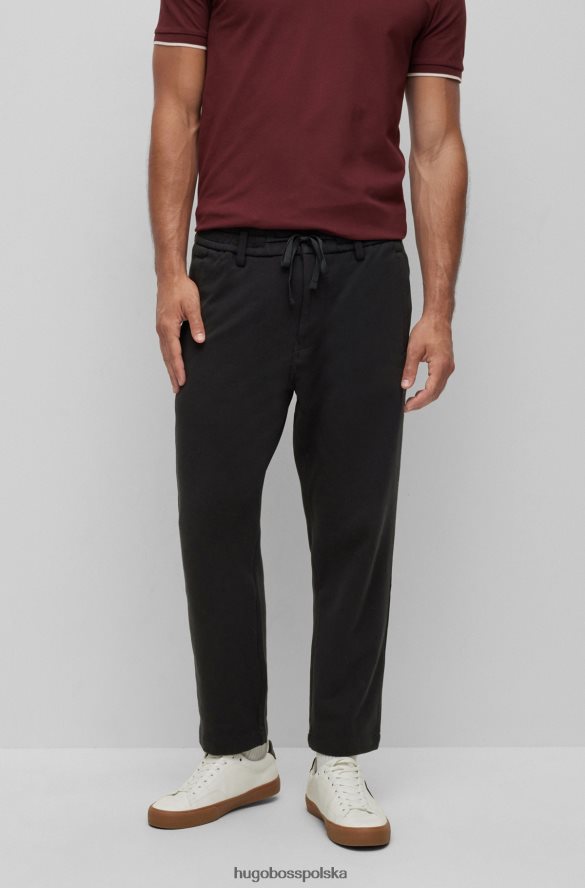 Hugo Boss czarne, zwężane spodnie Hugo z dwukolorowego dżerseju z domieszką bawełny czarny R0X0H63339