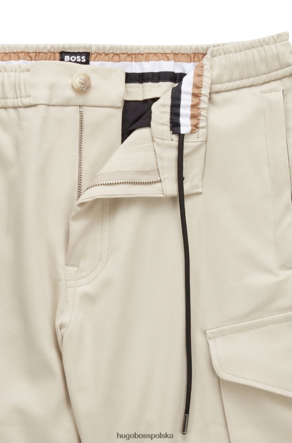 Hugo Boss jasnobeżowe spodnie cargo z mieszanki bawełny z charakterystycznymi wykończeniami hugo jasny beż R0X0H64572