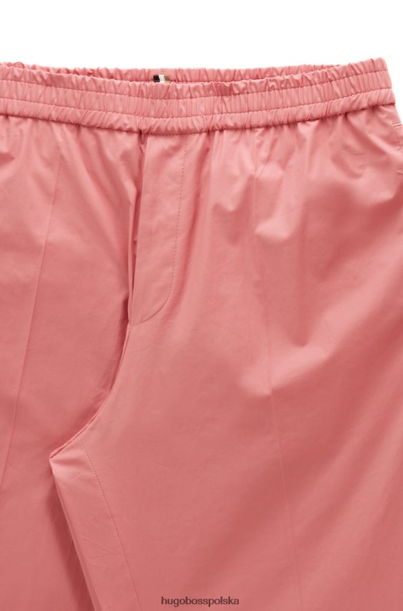 Hugo Boss jasnoróżowe, długie, luźne spodnie Hugo z elastycznej bawełny jasnoróżowy R0X0H64437
