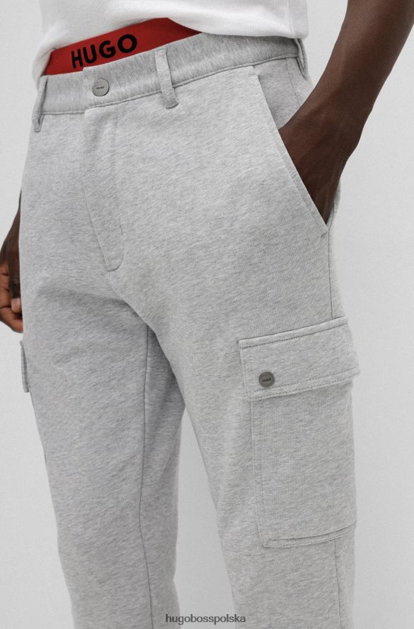 Hugo Boss jasnoszare, dopasowane spodnie cargo hugo z super elastycznej melanżowej bawełny jasnoszary R0X0H63787