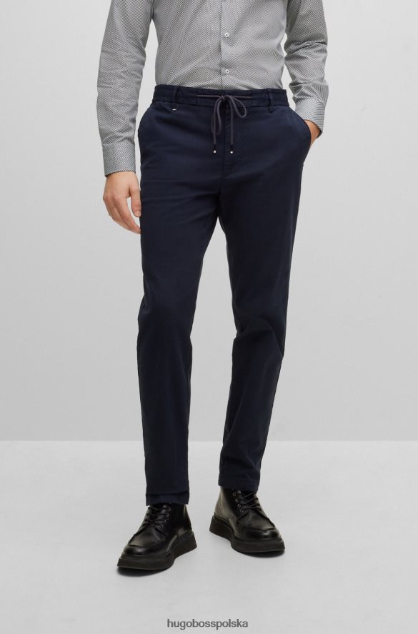 Hugo Boss spodnie slim-fit z gabardyny hugo w kolorze ciemnoniebieskim ciemny niebieski R0X0H62836
