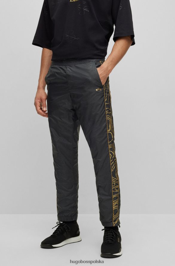Hugo Boss x ajbxng Zwężane spodnie z lekkiego materiału emed czarny R0X0H63692