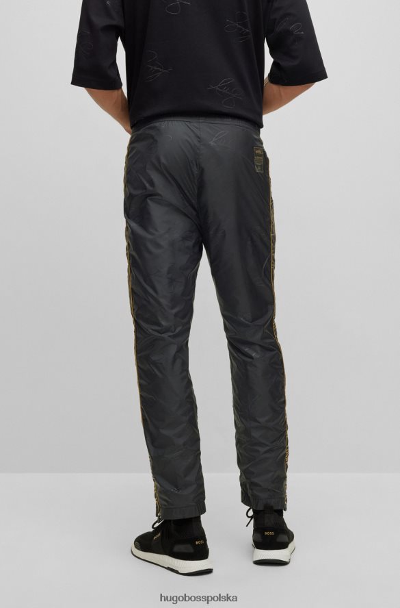 Hugo Boss x ajbxng Zwężane spodnie z lekkiego materiału emed czarny R0X0H63692