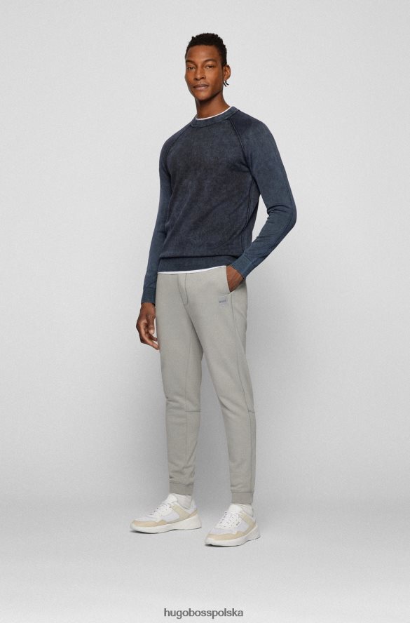 Hugo Boss Sweter o regularnym kroju z barwionej bawełny z charakterystycznymi detalami hugo w kolorze ciemnoniebieskim ciemny niebieski R0X0H62527